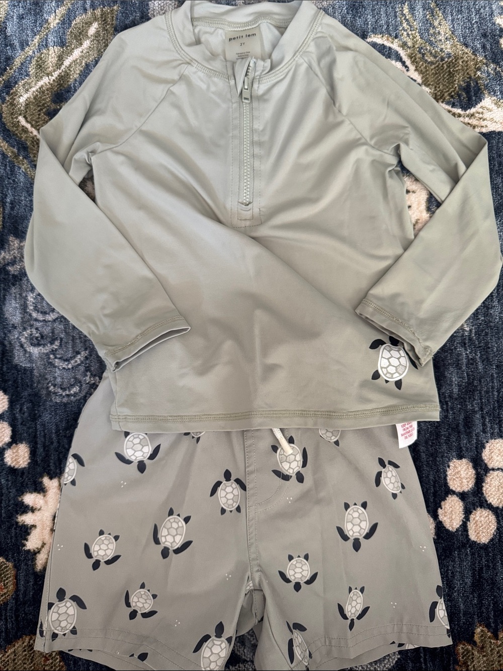 Petit Lem EUC Green Turtle Swim trunks and rashguard.